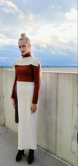 HER ASYMMETRIC SKIRT